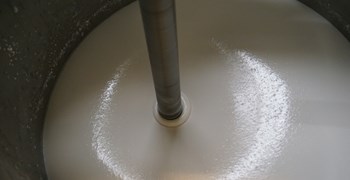 White paint in a mixing machine